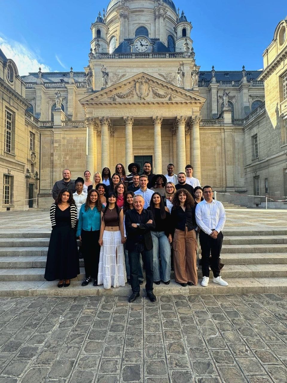 TLTE master's cohort in the Sorbonne courtyard